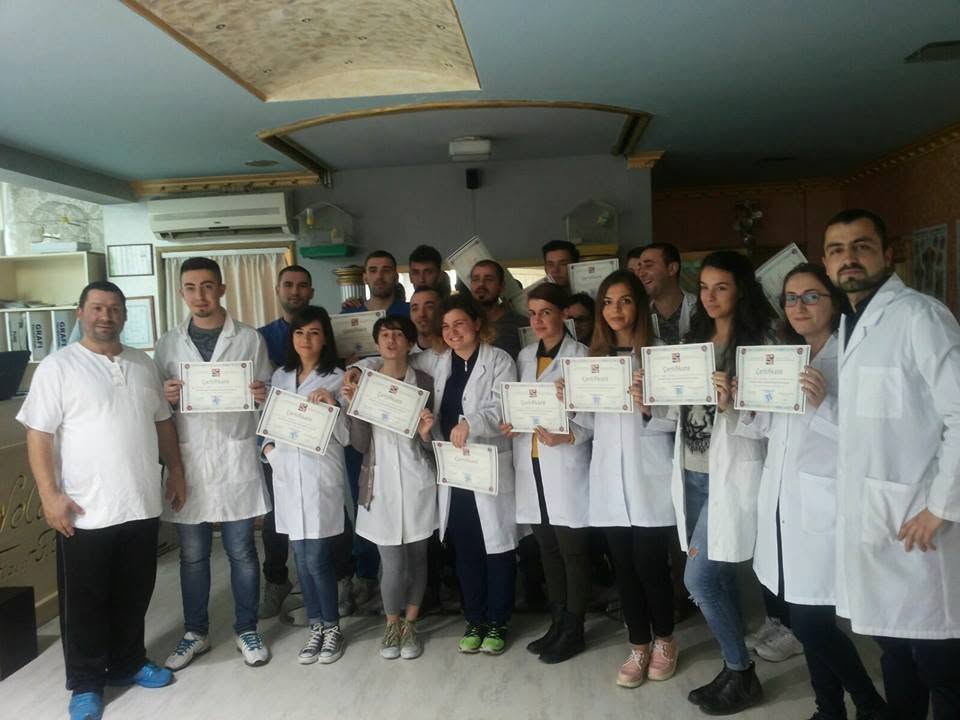 SHRFPAK training participants holding their certificates after completing a rehabilitation course
